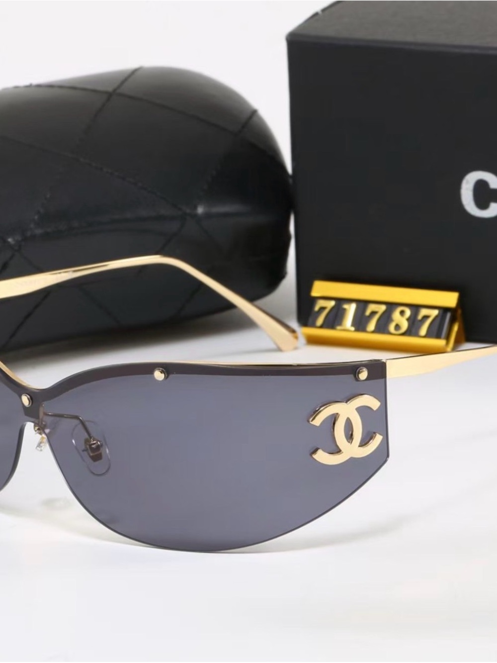 Chanel Women's Black Shield Sunglasses with Gold CC Logo